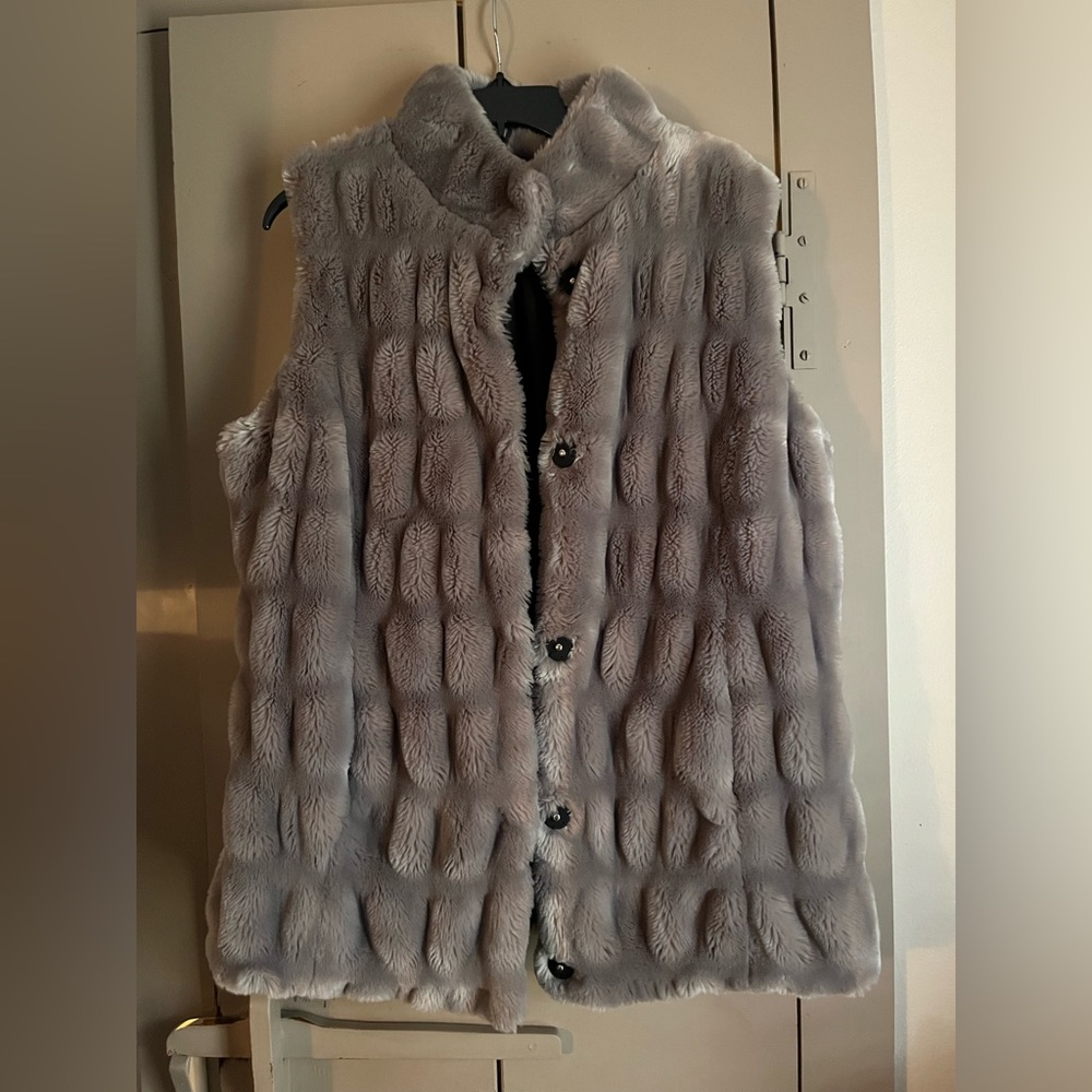 Faux fur reversable vest. Size XL Very warm.